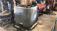 Poly Tank In Metal Cover,