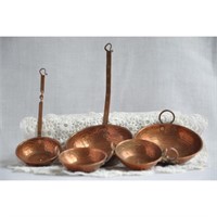 Set of vintage miniature copper pans and utensils