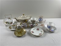 Cups and saucers/teapots/assorted glass