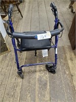 Wheeled walker with seat and breaks
