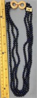 22" Triple strand lapis bead necklace           (g