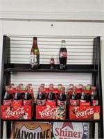 Two Shelf lot of Collector Coke Bottles