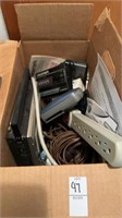 Box of power cords, radios, walkmans etc