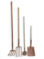 Bundle of gardening tools - shovel, pitchforks,