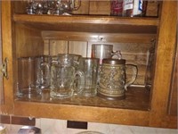 Lot of Steins and mugs. Assorted sizes and styles.