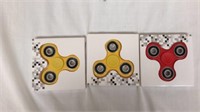Three fidget spinners
