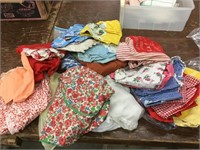 Large lot of vintage aprons