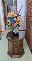 End table with faux floral arrangement