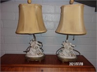 (2) Antique figural lamps.