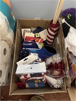 Box of Americana decor - flags, wood signs, bows,