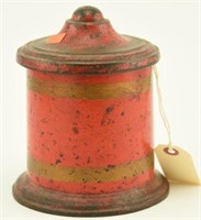 Lot #190 - Early cast iron tobacco jar in red