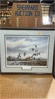 Framed and matted picture of geese