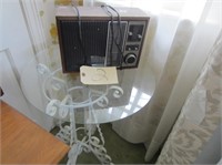 white wrought iron glas top table, radio