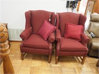 Pair of wingback chairs with deep red upholstery