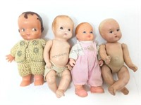 Vintage molded small dolls.