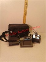 3 vintage Polaroid cameras and case