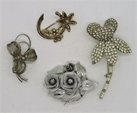 4 SILVER TONED FLOWER DESIGN BROOCHES