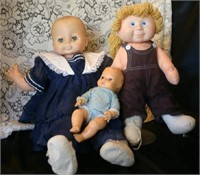 3 various dolls