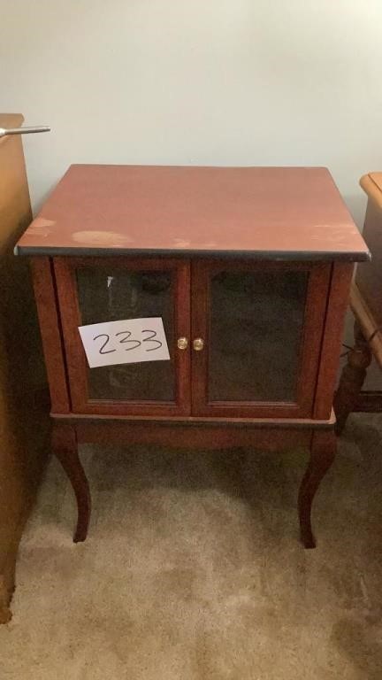 Side table with doors. Measures approximately 19