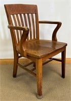 DESIRABLE 1910 SOLID OAK DESK CHAIR W SADDLE SEAT
