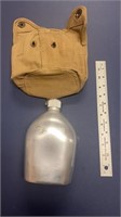 F13) US Army type canteen. Canteen says US WPGCo