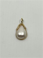 14k Gold and Mother of Pearl Pendant.