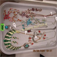 GROUP OF 4 TRAYS OF ASSORTED COSTUME JEWELRY