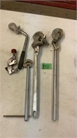 Assorted pipe benders and cutter