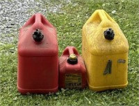 Group of 3 plastic gas cans