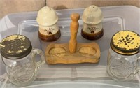 Vintage shakers and a wooden holder
