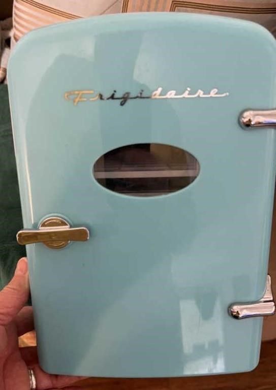 Baby blue Frigidaire mini fridge