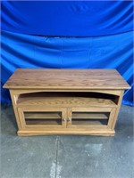 Wood entertainment center, dimensions are 51 x 19