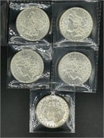 5 - 1881-O Morgan silver dollars