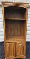 Oak bookcase w/ storage w/ doors