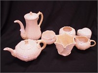 Seven pieces of Belleek china: five are