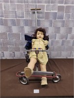 Antique doll with stroller