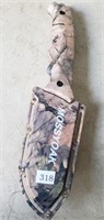 About a 10 1/2" Mossy Oak Knife with a 4 1/2"