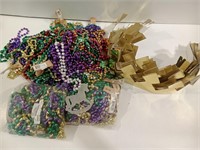 Lot of Mardi Gras Beads and Paper Crowns