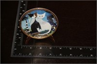 Tiny decorative cat dish on stand