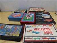 (7)Assorted diecast cases, space case, cards.