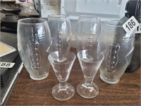 4 FOOTBALL GLASSES AND 2 SHOOTERS