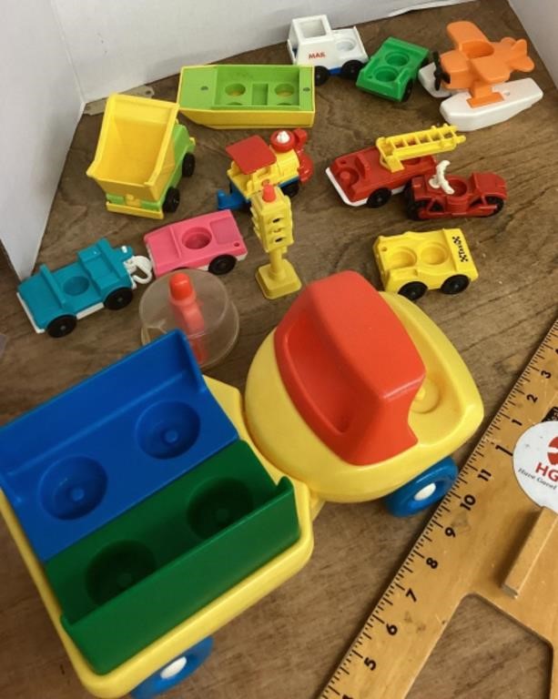 Group of Fisher-Price vehicles and accessories
