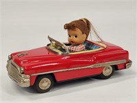 VINTAGE JAPAN TIN FRICTION GIRL IN CONVERTIBLE