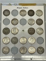 19 - 1884/1890-O Morgan silver dollars in case