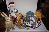 mixed stuffed toys; animated Santa figure