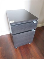 A Two Drawer Ebonized Side Cabinet