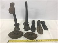 Cast-iron shoe repair stands and irons.