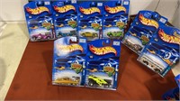 8 Hot wheels New on card  this lot includes