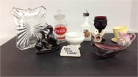 Assorted items. Glass picture frame. Ashtray.