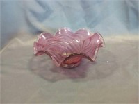 Pink glass dish with ruffled edge